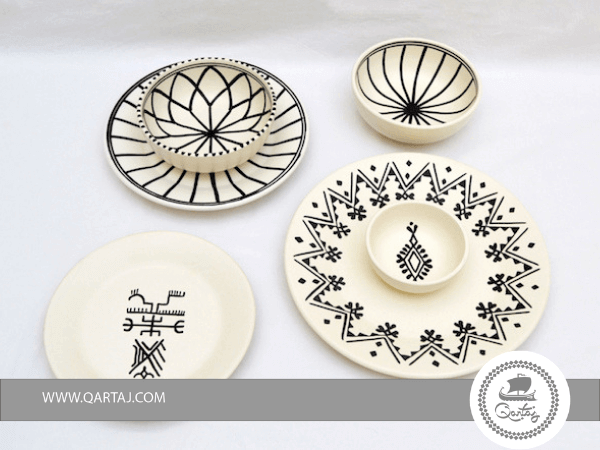 Set Of White Ceramics With Black Decoration
